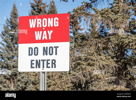 Wrong Way Traffic Sign On City Street Stock Photo Alamy