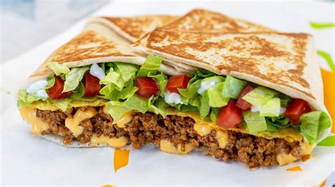 Taco Bell S Crunchwrap Is Finally Going Vegan