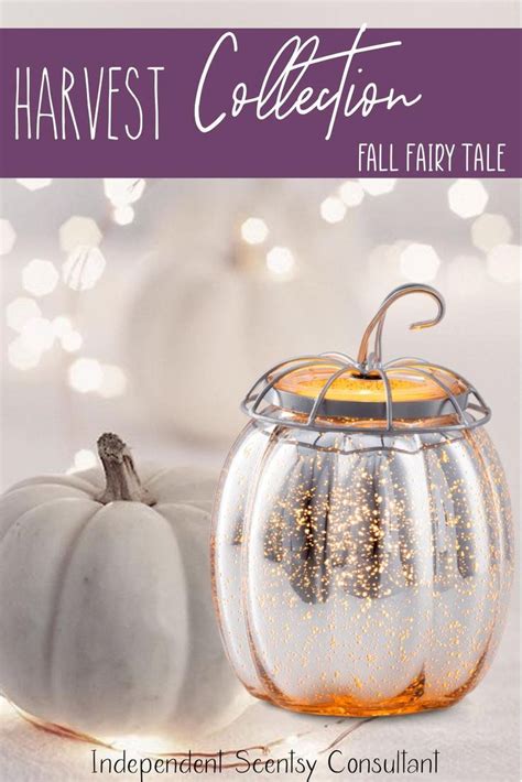 A White Pumpkin Sitting On Top Of A Table Next To A Glass Jar Filled