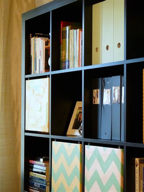 Hang Art Canvases To Cover Unsightly Items On Your Expedit Bookcase