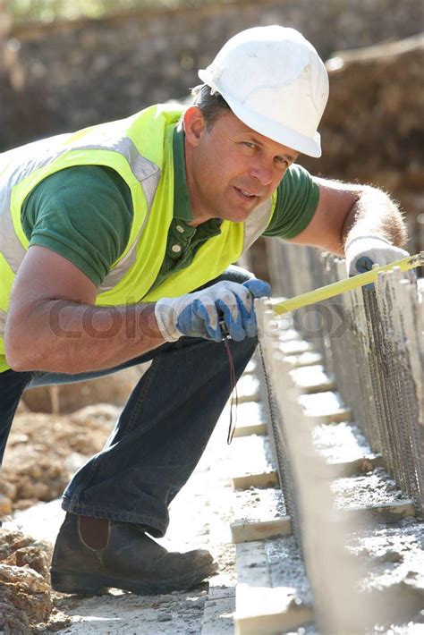 Construction Worker Laying Foundations Stock Image Colourbox