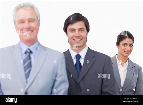 Smiling Mature Businessman With His Employees Stock Photo Alamy