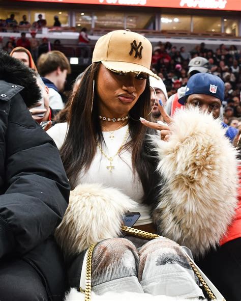 Megan Thee Stallion Attends The Bulls Vs Celtics Game In A Dsquared Fur