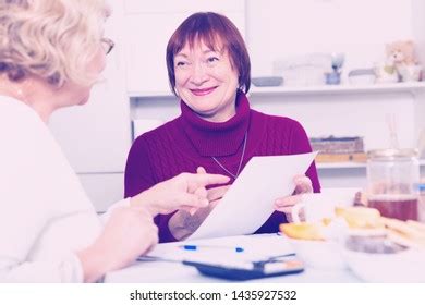 Portrait Cheerful Mature Females Documents Communal Stock Photo