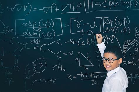 Premium Photo Male Student Writing Mathematical Formula In Class
