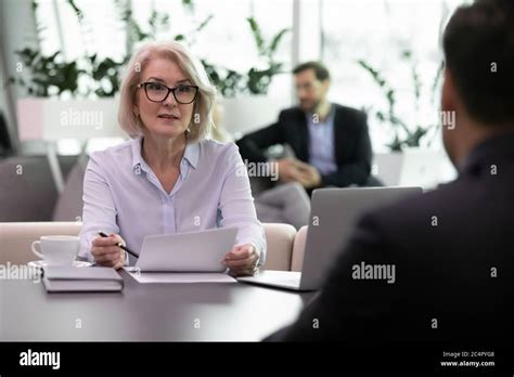 Adult Business Woman Interview Job Candidate Holding Resume Stock Photo