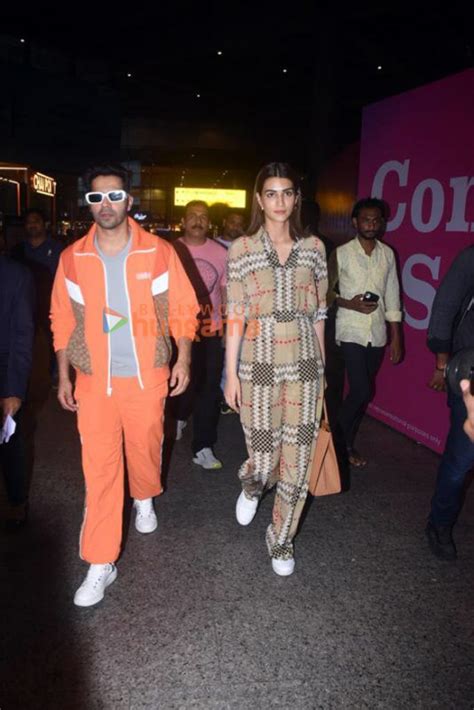 Photos Varun Dhawan And Kriti Sanon Snapped At The Airport Parties