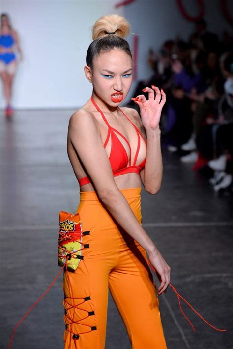 Man Rushes Onto Runway To Grab Bag Of Flaming Hot Cheetos
