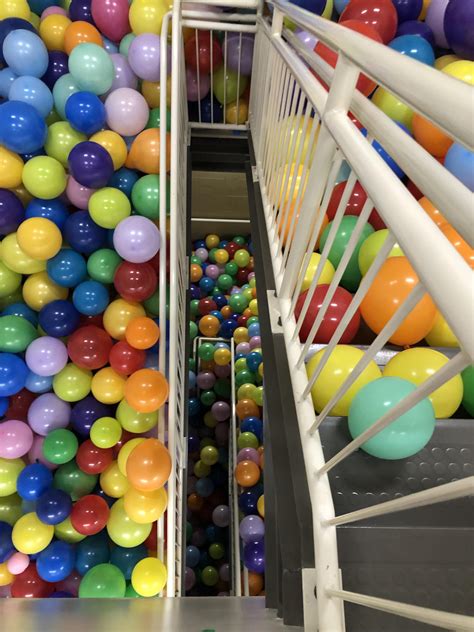 Today is senior prank day, staircases were filled with 27,000 balloons : r/highschool