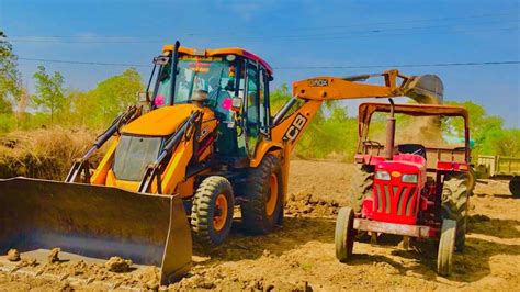 JCB 3dx Backhoe Machine Loading Mud In John Deere Tractor Jcb Mitti