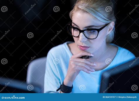 Involved Female Programmer Practicing Skills In The Office Stock Image