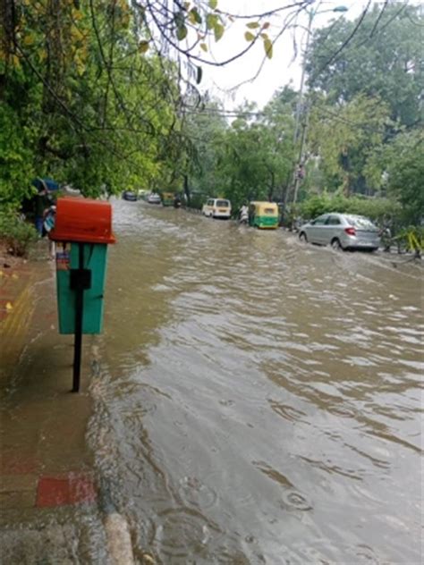 Heavy Rain In Delhi Causes Waterlogging Traffic Snarls