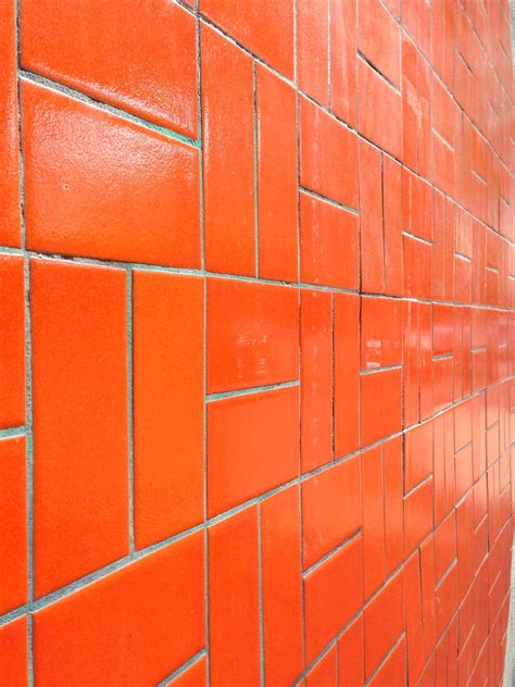 Add A Burst Of Color To Your Home With An Orange Glass Subway Tile Home Tile Ideas