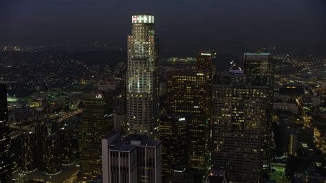 HD Stock Footage Aerial Video Of A Smoggy Skyline Beyond Hills