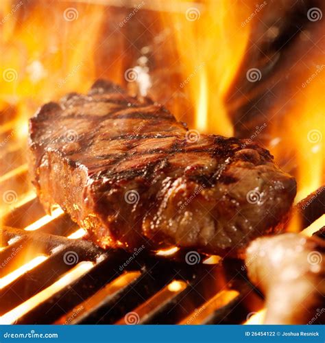 Beef Steak On The Grill With Flames Stock Photo Image Of Grill Fire