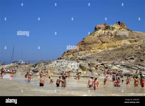 Tourists Visiting The Hot Mud Baths Laghetto Di Fanghi Aeolian