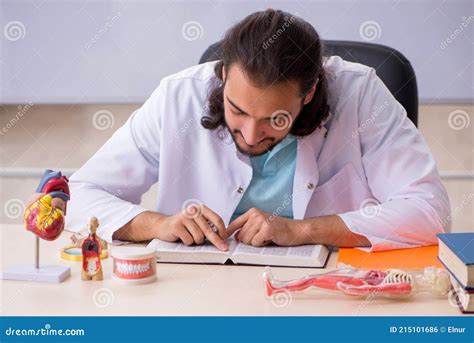 Young Male Student Studying Human Anatomy Stock Photo Image Of Books