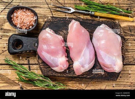 Boneless Raw Chicken Thigh Fillet Wooden Background Top View Stock