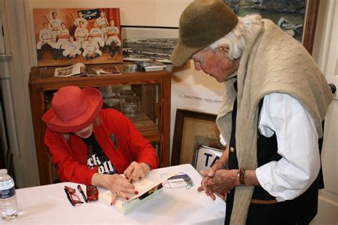 Author Gael Greene signs a book for David Wolkowsky. (photo: Michael Blades) - Key West Literary ...