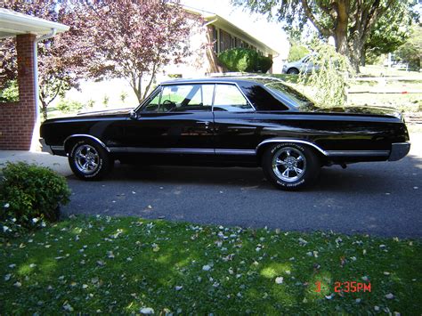 one classy 1965 Oldsmobile F 85 Cutlass