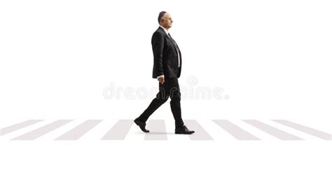 Full Length Portrait Of A Mature Man Leaning On A Pile Of Suitcases And