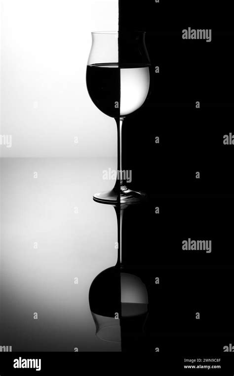 Elegant Wine Glass In Black And White With Strong Reflection And