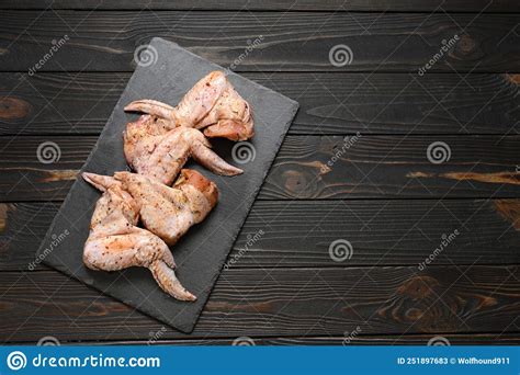 Marinated Chicken Wings On A Rustic Wooden Background Stock Image