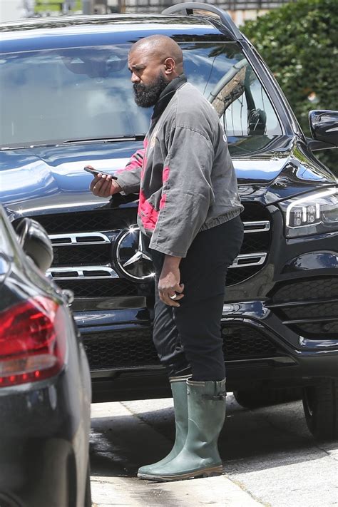 Kanye West Looks Unrecognizable With A Big Smile Full Beard And