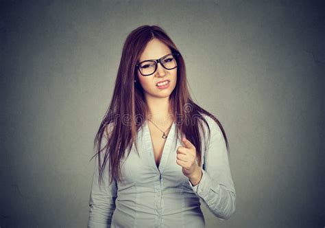 Annoyed Upset Woman In Glasses Looking At Her Cell Phone With