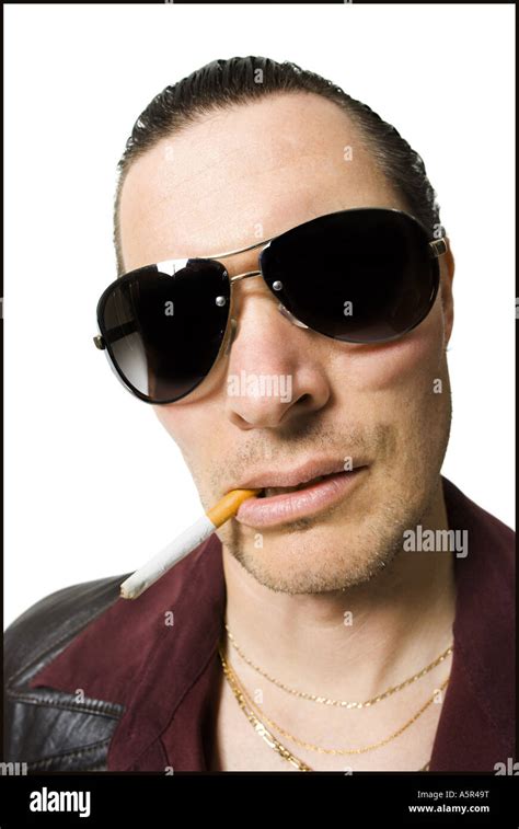 Man In Sunglasses Smoking Cigarette Stock Photo Alamy