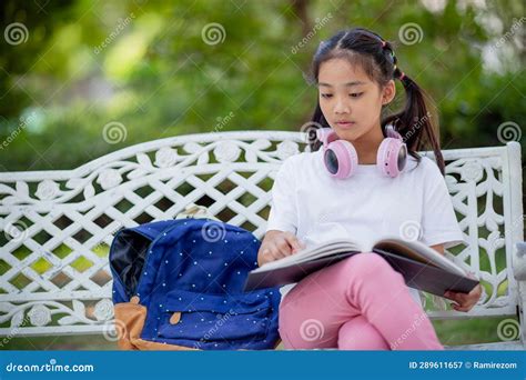 Back To School Asian Girl Reading A Book Stock Image Image Of School