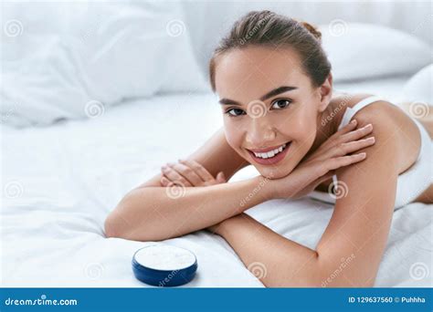 Beauty Face Skin Care Woman With Beautiful Skin And Cream Stock Photo