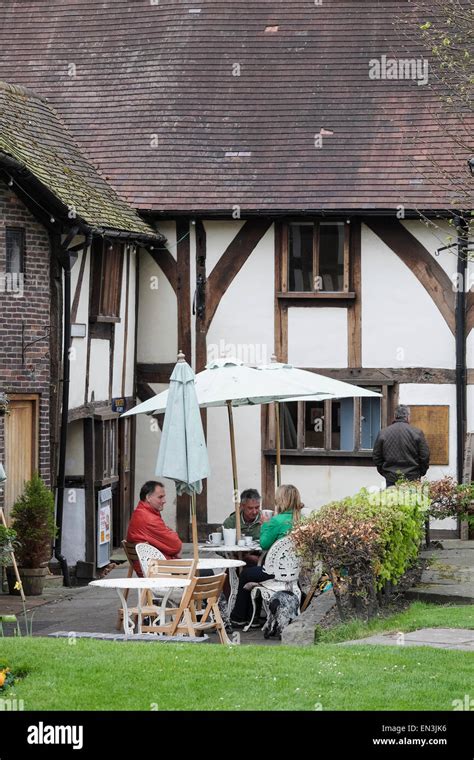 Shrewsbury, Shropshire: Relaxing outside one of the Town's historic ...