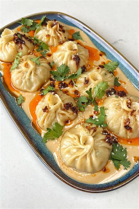 Delicious Chicken And Prawn Dumplings With Chili Tahini Sauce