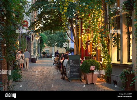 Restaurant at night in the old town, Antwerp, Belgium Stock Photo - Alamy