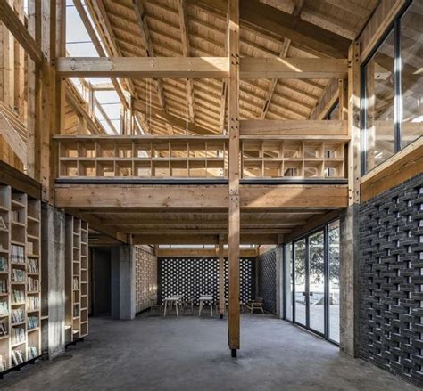 The Inside Of An Empty Building With Lots Of Shelves On Each Side And