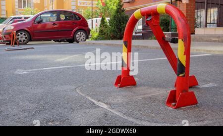 Barrera de estacionamiento manual con candado y señal de parada