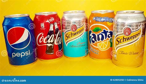 Soda Cans Collection Isolated In Yellow Background Editorial Stock