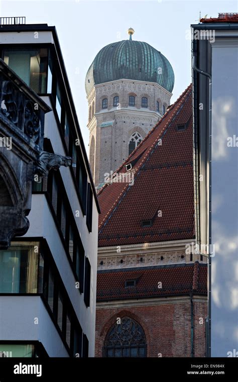 Frauenkirche (church of our lady) dome seen between buildings, Munich ...