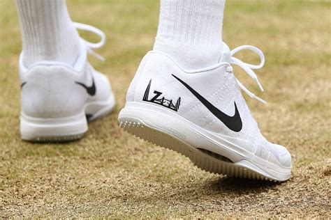 Roger Federer is still wearing personalized Nike shoes at Wimbledon ...