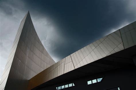 The Silver Curved Facade Of Imperial War Museum North In Manchester