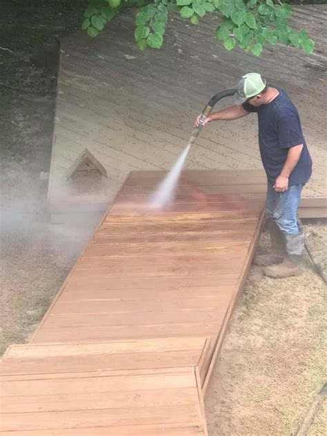 Sandblasting A Deck To Remove All The Old Paint And Stains Taking It