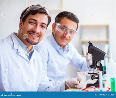 Team Of Chemists Working In The Lab Stock Image Image Of Sample