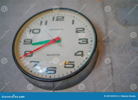 Analog clock on the wall stock photo. Image of routine - 301359316