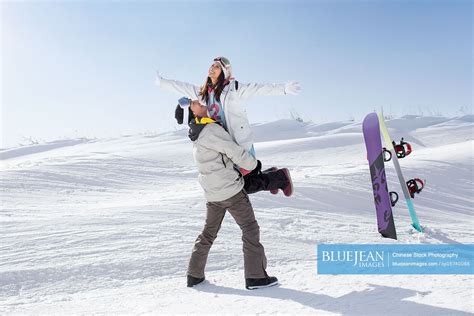 Happy Young Couple Skiing In Ski Resort High Res Stock Photo For Download