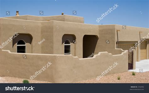 Adobe Home With Stucco Exterior And Privacy Wall Stock Photo 2732992