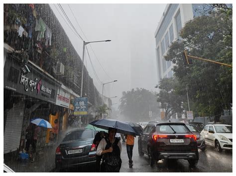 Mumbai Rains Heavy Downpour Disrupts Flight Train Services IMD