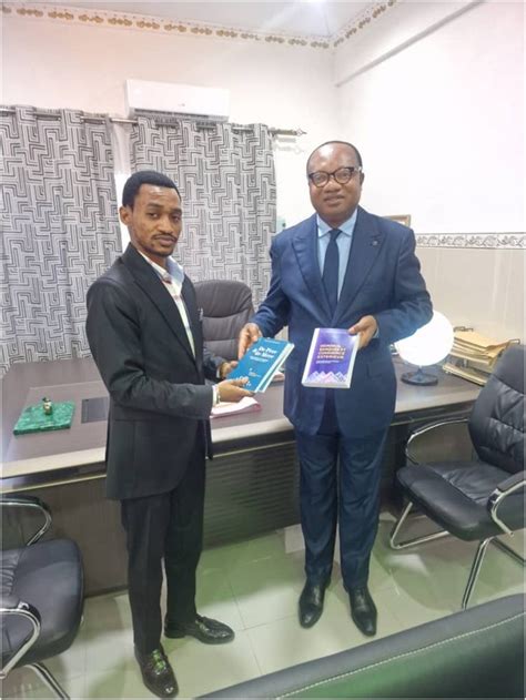 ESU Le recteur de lUniversité Simon Kimbangu et Noël Tshiani