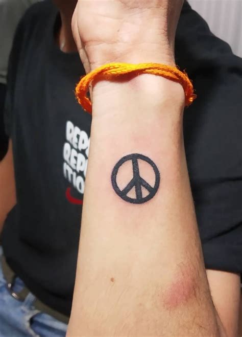 81 Impressive And Alleviating Peace Wrist Tattoo Designs Ink Of