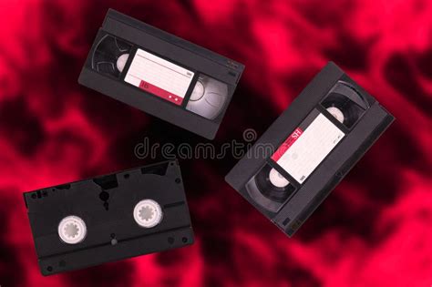 Video Cassettes VHS Pal Secam Red And Black Blurred Retro Background